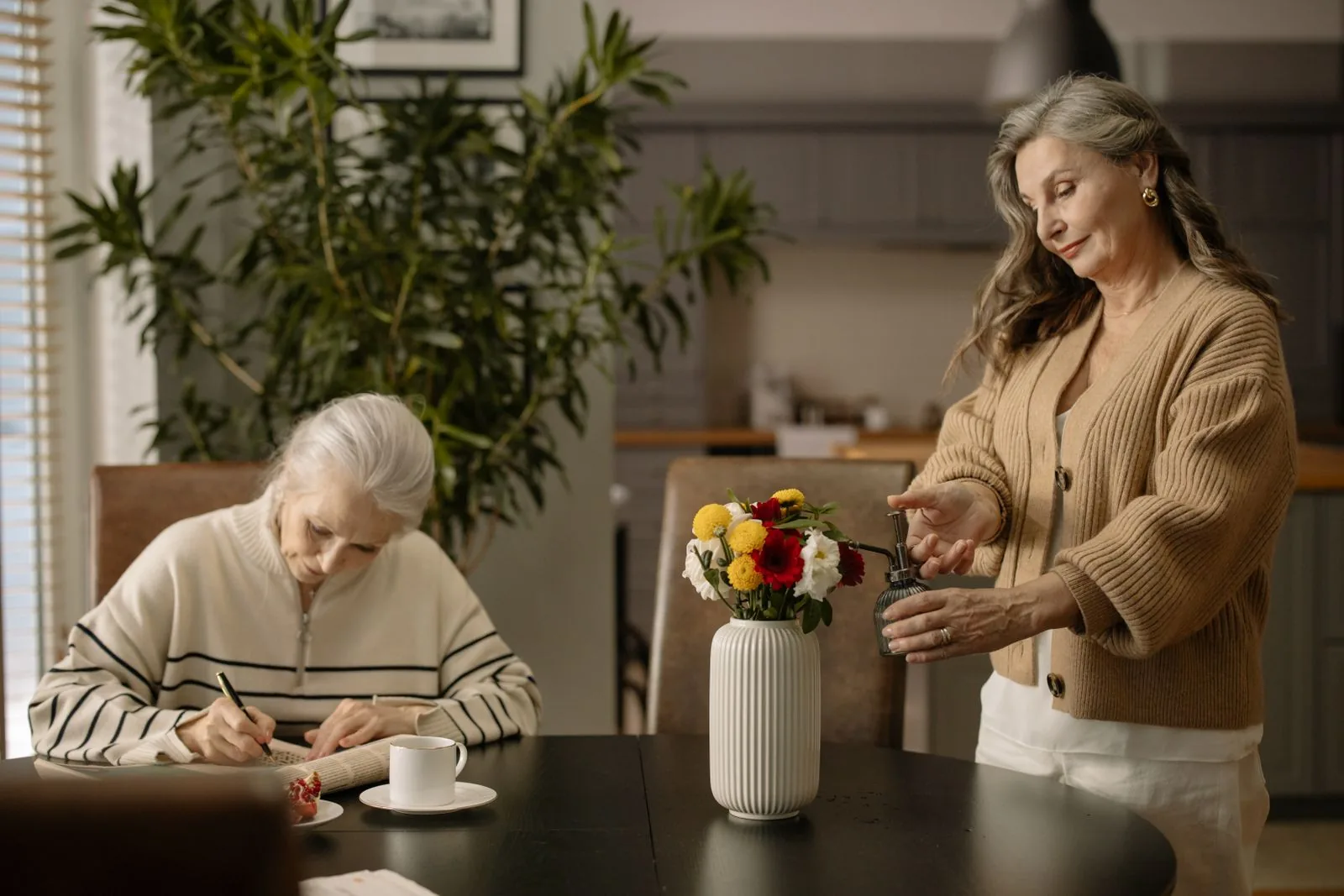 Older adults spending time together in a home-like dining room